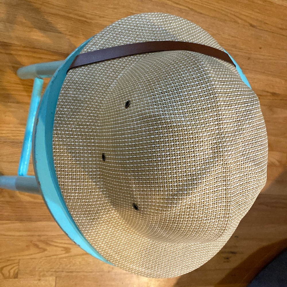 Well-made paper straw, Safari hat. It is adjustable.